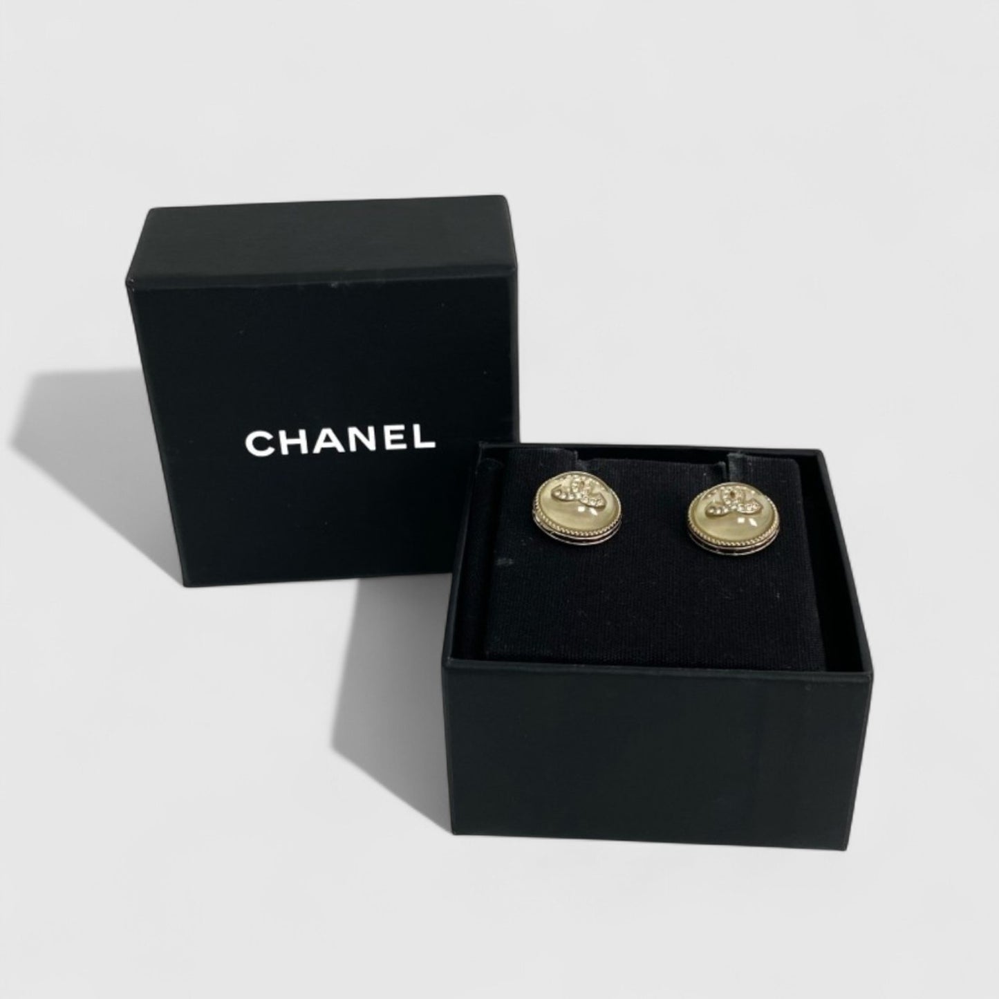 Vintage Rank S CHANEL Logo Metal Earrings Gold